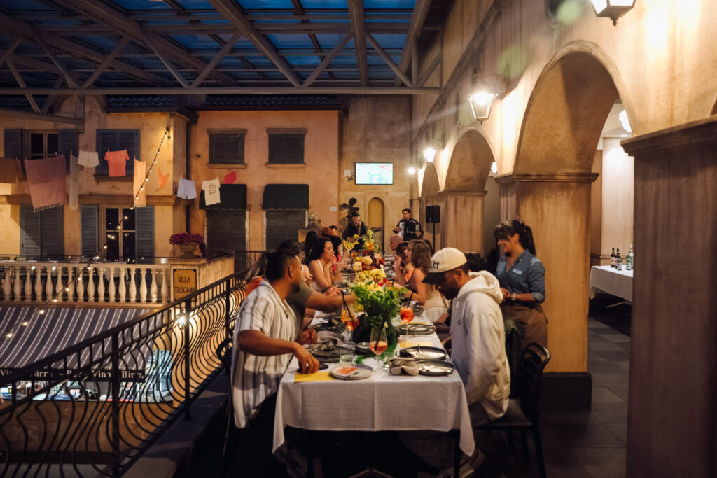 Influencer dinner event at La Piazza featuring elegantly set tables, fine dining presentation, and refined restaurant ambiance
