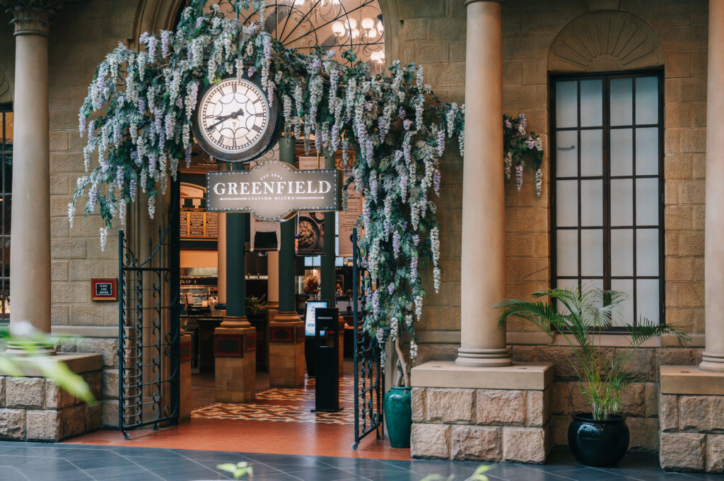 Entrance of Greenfield Bistro featuring a modern façade, stylish signage, and welcoming café and dining venue exterior design